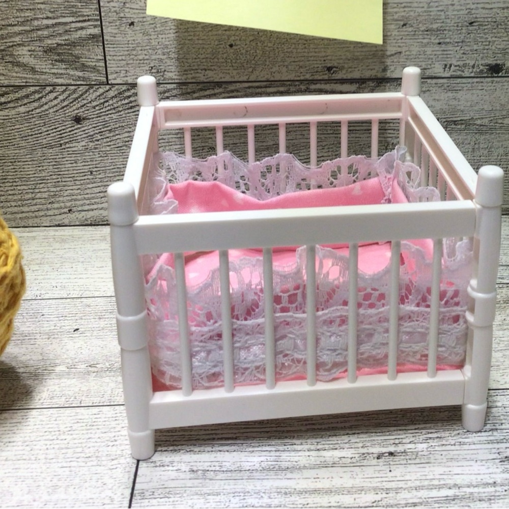 Pink and White Doll Crib with bumper pad with Lace . Great for my mi baby dolls